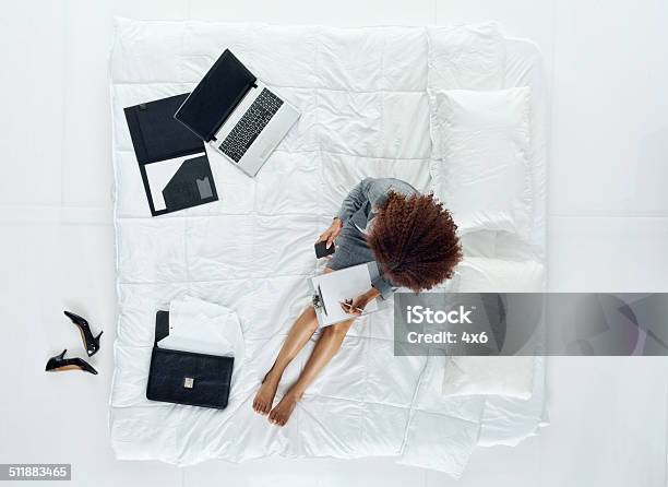 Above View Of Businesswoman On Bed Using Mobile Stock Photo - Download Image Now - Bed - Furniture, Holding, Pen
