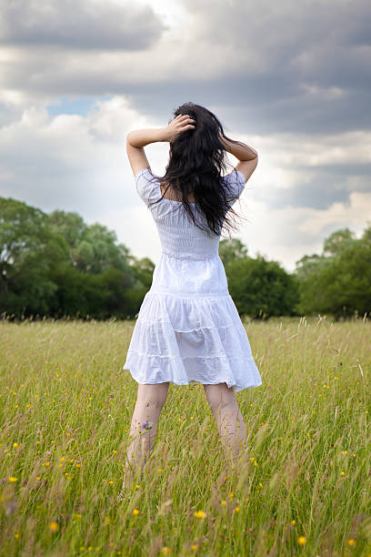 istock Sexy young woman on grass field 511883983