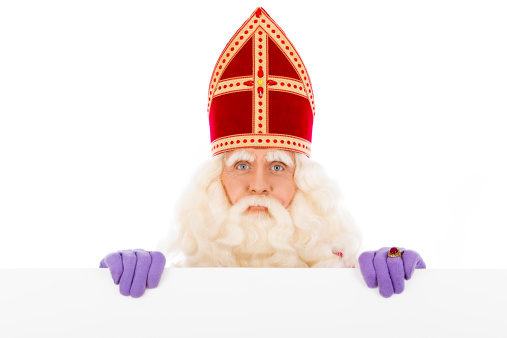 Sinterklaas with placard. isolated on white background. Dutch character of Santa Claus