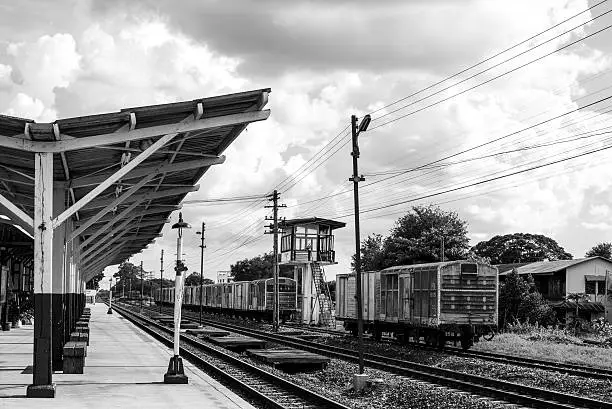 Photo of black and white railway station