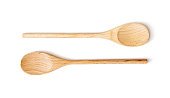 Two wooden spoons on the white background