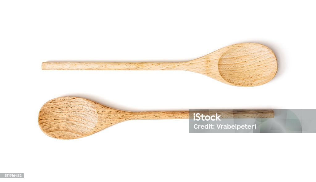 Two wooden spoons on the white background Two wooden spoons on the white background. Kitchen equipment. Wooden Spoon Stock Photo
