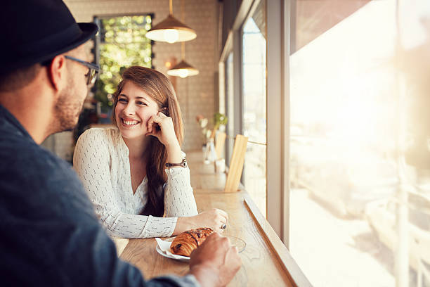 istock Happy young couple at coffee shop 511918240