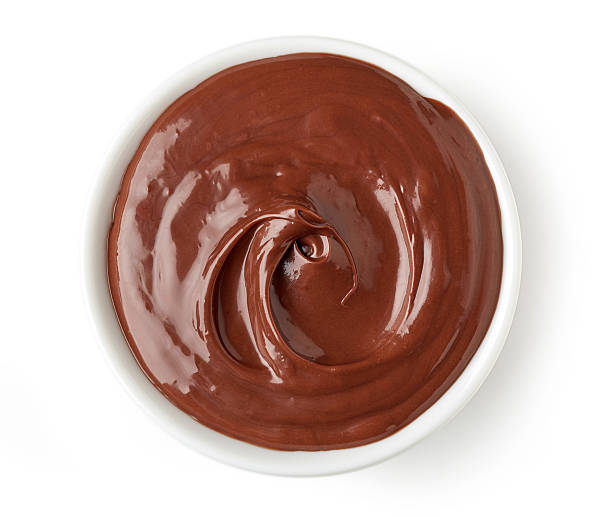 istock Chocolate cream in round dish isolated on white background 511918598