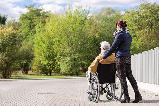 istock Disabled senior in the park 511918960