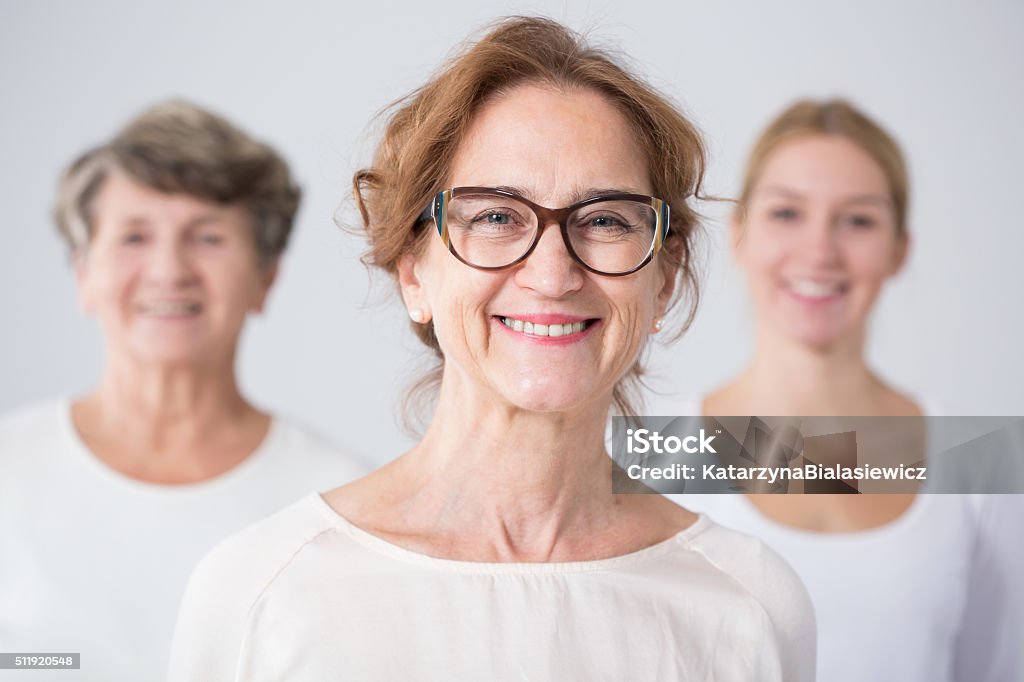 Three generations of female family Portrait of three generations of female family Mature Women Stock Photo