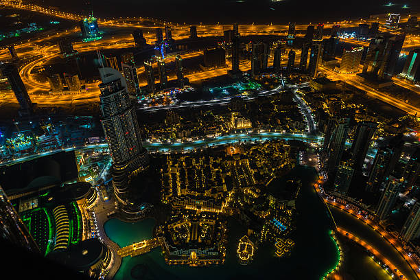 istock Dubai downtown night scene with city lights. Top view 511923150