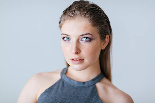 istock Pretty woman with fresh skin looking at camera 511924650