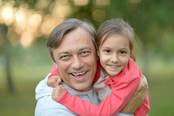 istock Happy Caucasian father holding his daughter 511925368
