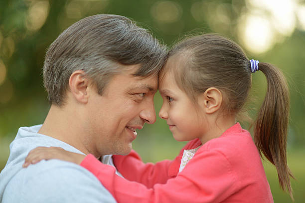 istock Father hugging his little daughter 511925748