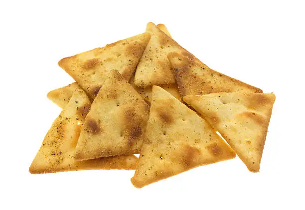 A serving of pita crispy snack crackers isolated on a white background.