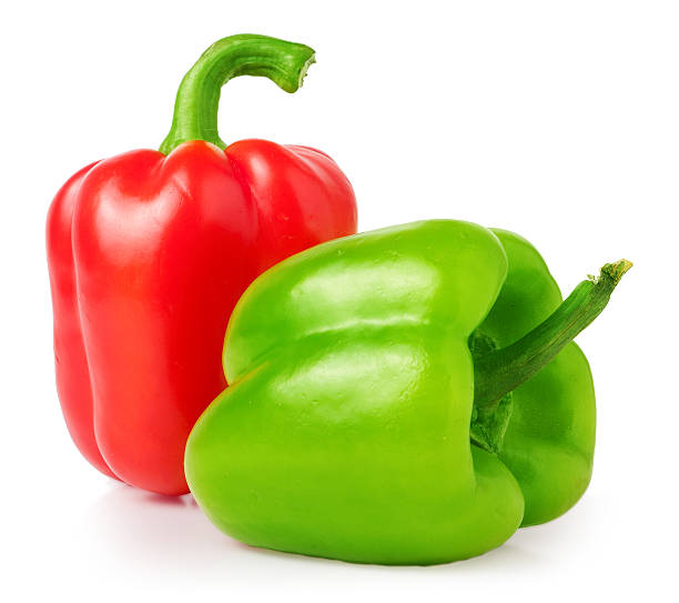 istock red and green sweet pepper isolated on white 511929586