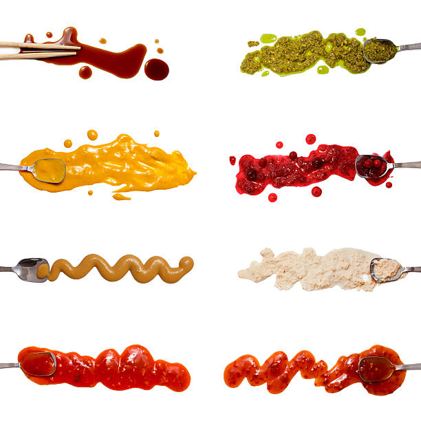istock Set of 8 savory sauces and toppings isolated on white 511930330