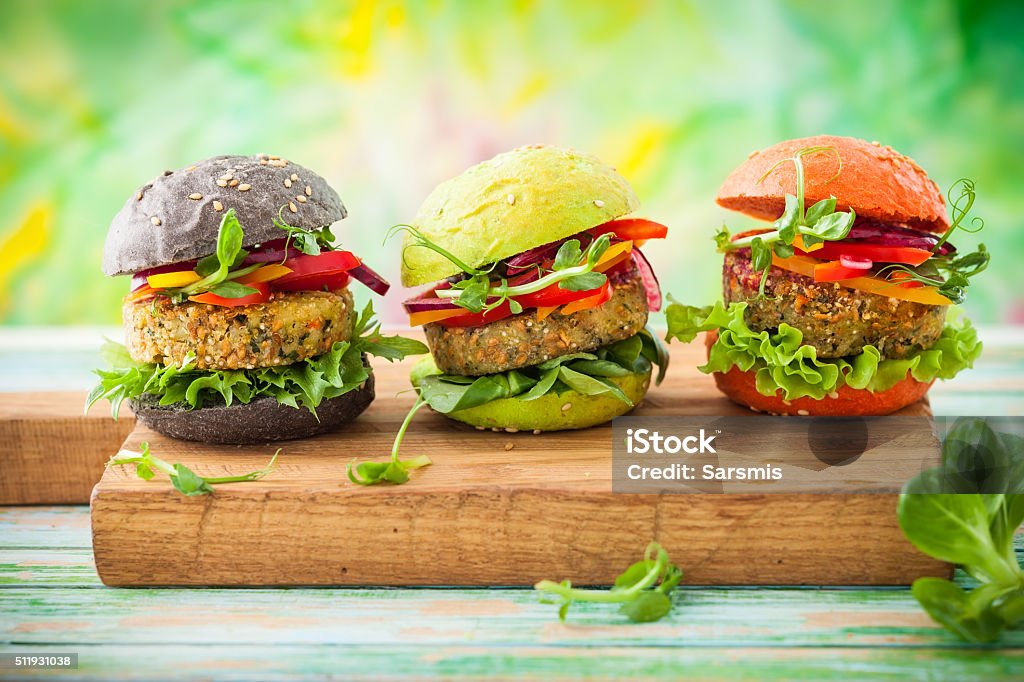 color burger Red, green,black mini burgers with quinoa and vegetables Vegan Food Stock Photo
