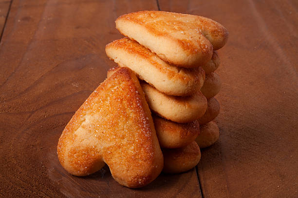 istock stack cookies in the shape of  heart on  wooden board 511931752