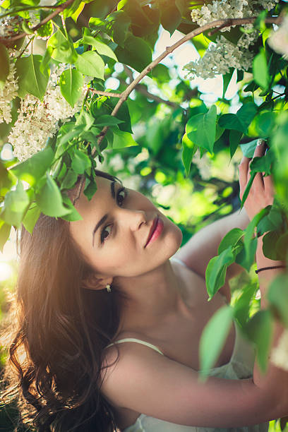 istock Beautiful woman in park 511932938
