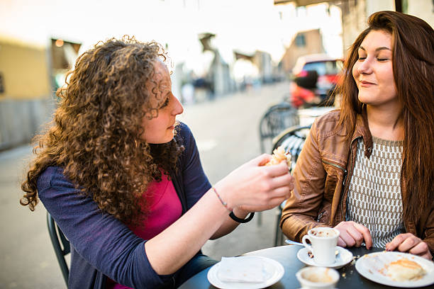 istock woman talking at the cafe 511933264
