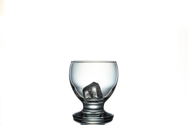 istock Ice in the glass on white background 511933554