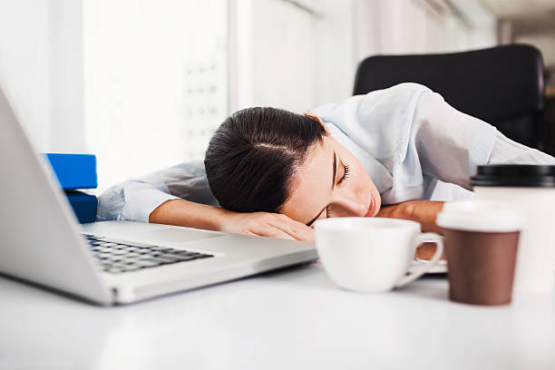 Tired woman in the office