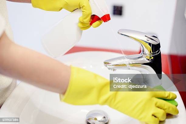 Female Hands Spraying Liquid Detergent On Tap Stock Photo - Download Image Now - Adult, Bathroom, Bathtub