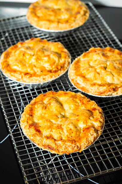 istock Homemade Chicken Pot Pies Cooling On A Rack 511937618