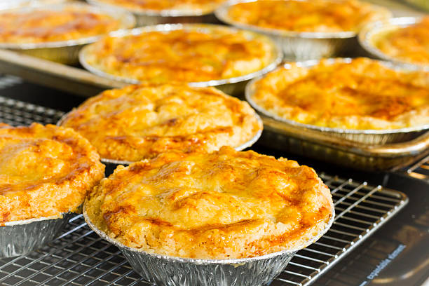 istock Homemade Chicken Pot Pies Cooling On A Rack 511937676