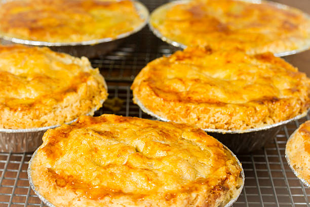 istock Homemade Chicken Pot Pies Cooling On A Rack 511937790