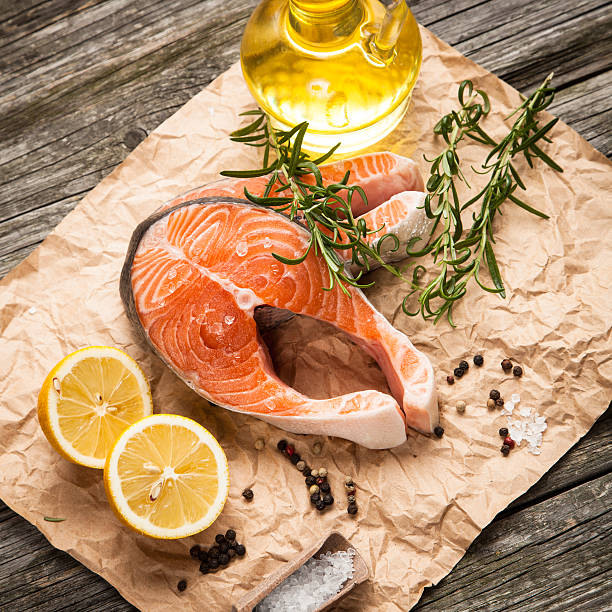 istock Fresh salmon on old wood 511939418