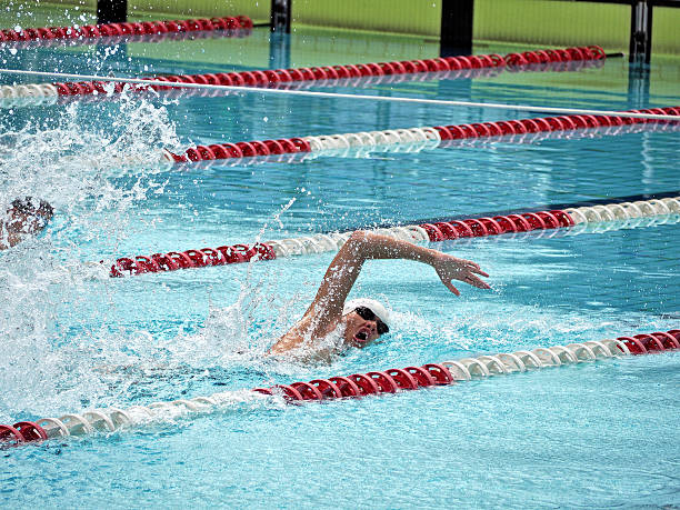 istock Swimmer in swimming competition 7 511941718