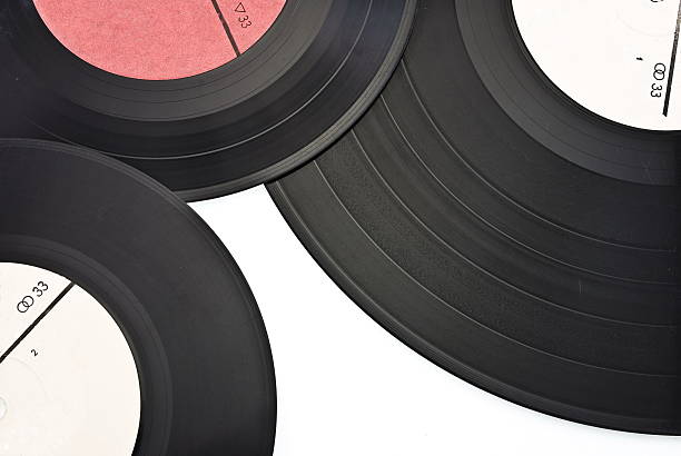 istock Old dusty scratched vinyl records 511943304
