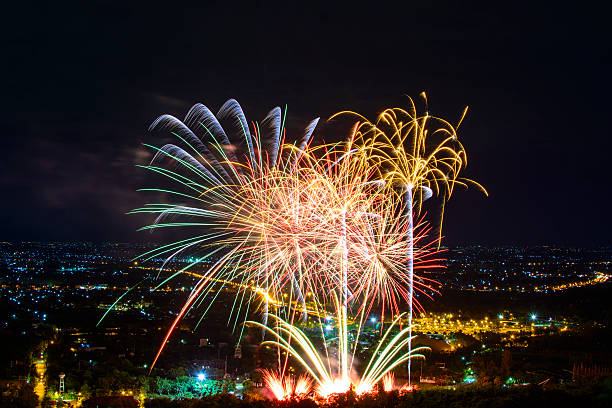 istock Fireworks on night city background 511943428