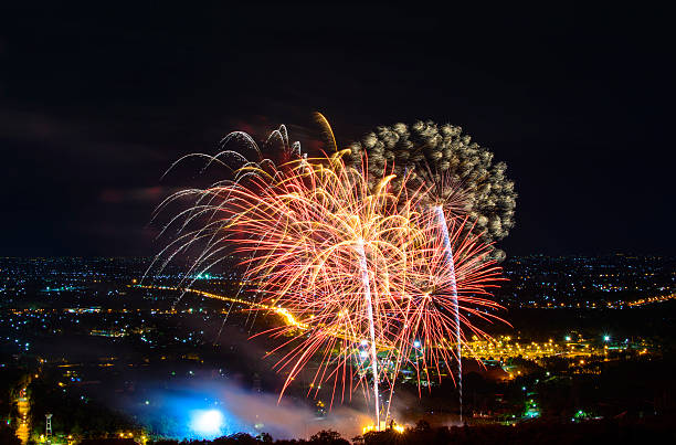 istock Fireworks on night city background 511944428