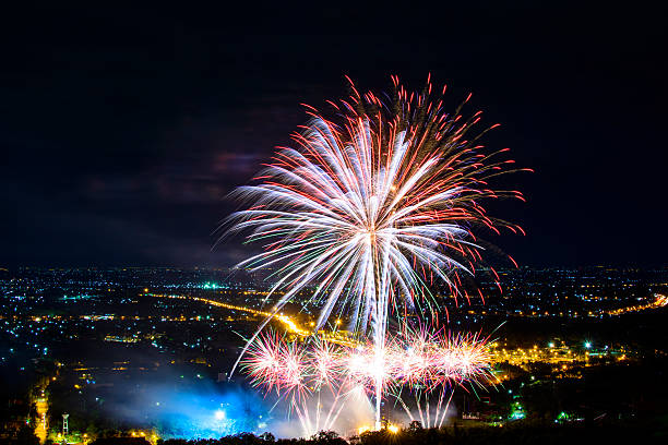 istock Fireworks on night city background 511944622