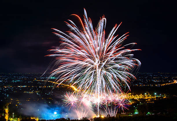 istock Fireworks on night city background 511944956