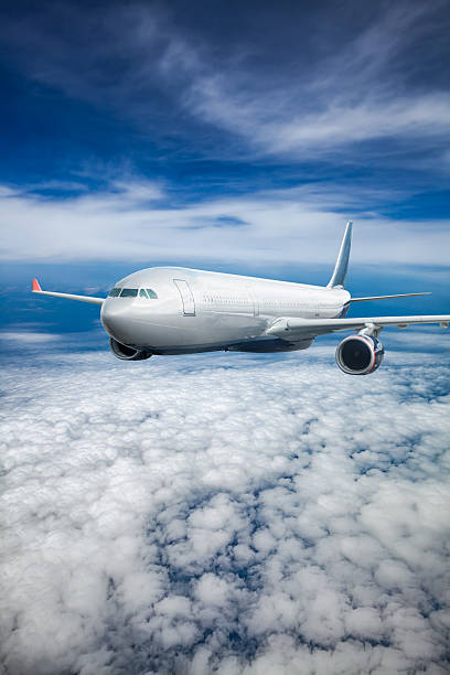 istock Passenger Airliner in the sky 511946298