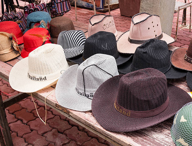 istock Many of hats hang on wall. 511947445