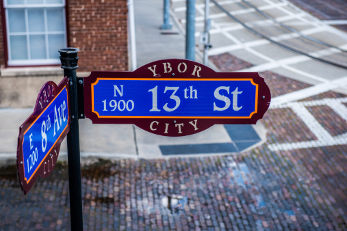 Niagara Falls, Ontario, Canada - September 24, 2020:  On Clifton Hill Street at Niagara Falls, you can see Ripley's Moving Theatre 4D, Frankenstein, Burger King, IHOP, Applebees, hotel and casino. On the street you can see people and a car on the road.