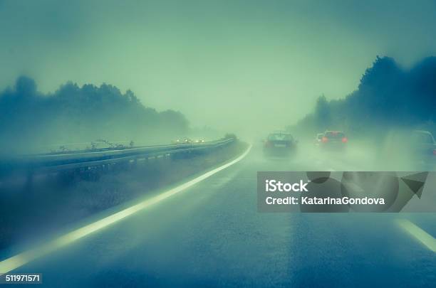 Fog And Rain On Highway Stock Photo - Download Image Now - Aspirations, Car, Danger