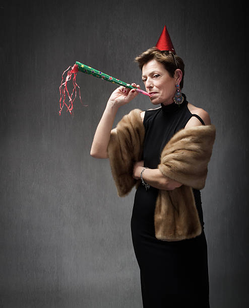 istock mature lady ready for new years party 511971603
