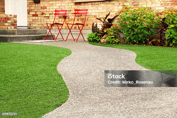 Walk Way With Perfect Grass Landscaping With Artificial Grass In Residential Area Stock Photo - Download Image Now