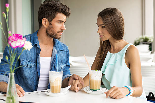 istock Two young people drinking frappe in restaurant 511972975