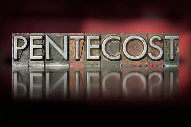 The word Pentecost written in vintage letterpress type