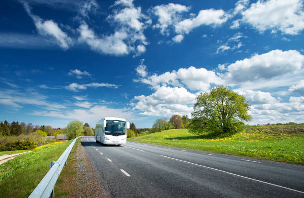 istock Bus on asphalt road in beautiful spring day 511975200