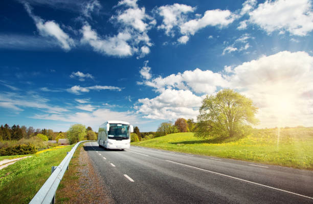 istock Bus on asphalt road in beautiful spring day 511975492
