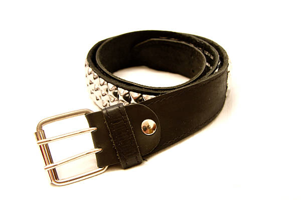 istock Black leather belt isolated on the white background 511975507