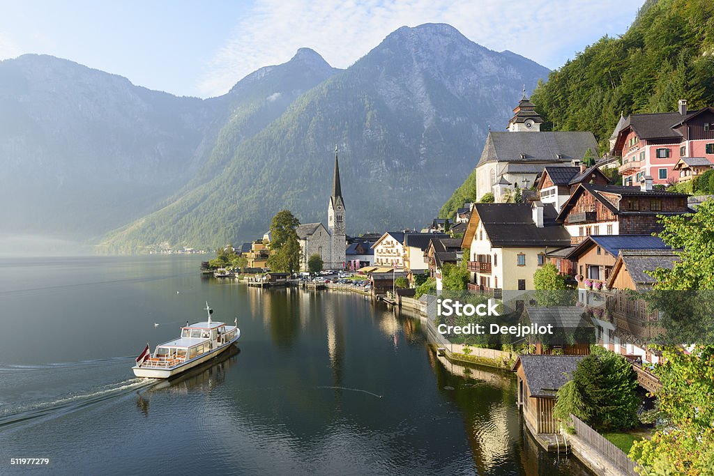 Lakeside Village of Hallstatt in Austria Ferry boat by the lakeside village of Hallstatt, Austria. Hallstatt Stock Photo