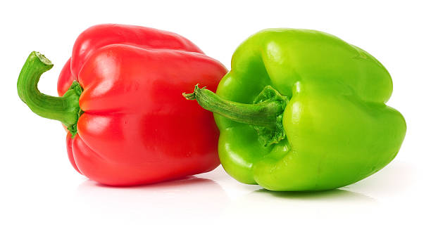 istock Bell peppers isolated on white background closeup 511977550