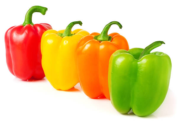 istock colored sweet peppers on a white background 511977596