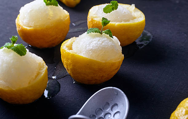 istock Lemon sorbet or ice cream inside fresh lemons 511980624