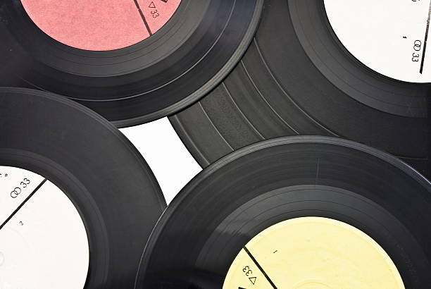 istock Old dusty scratched vinyl records 511981494